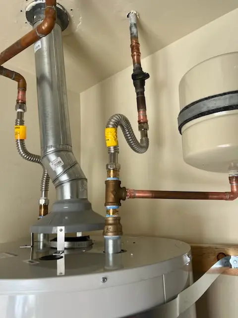 Water heater installation and plumbing repair in Wolfert